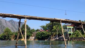 Begin your travel day with Vang Vieng’s serene ambiance